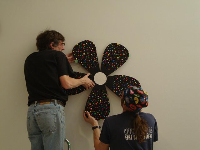 install - wallflowers (12).JPG - hanging the larger flowers was definately a two-person job